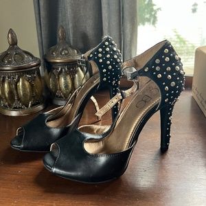 BCBG Paris black heels with gold rhinestones